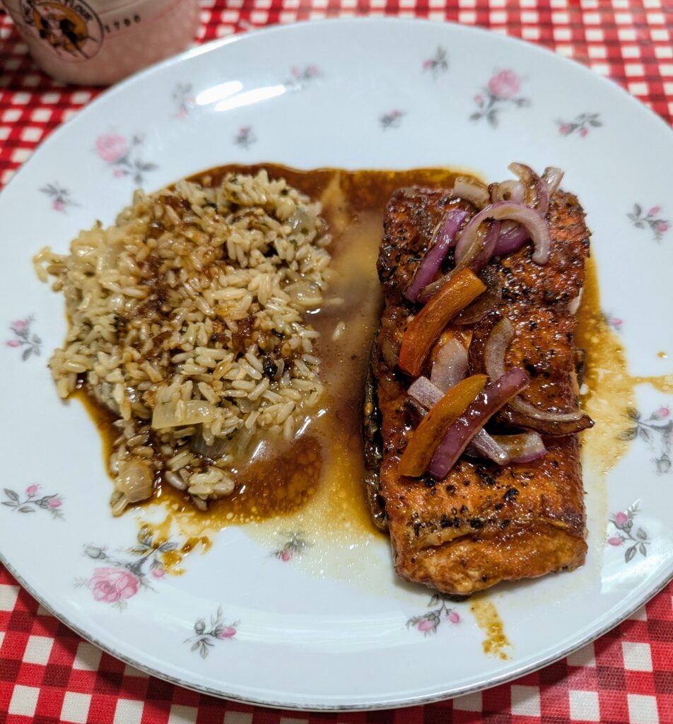 Rice and salmon with sautéed  onions and peppers with a soy-ginger-mustard-maple glaze