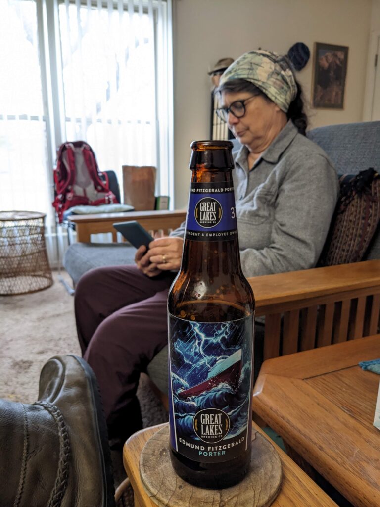 A bottle of Great Lakes Brewing's Edmund Fitzgerald Porter, with Jackie in the background